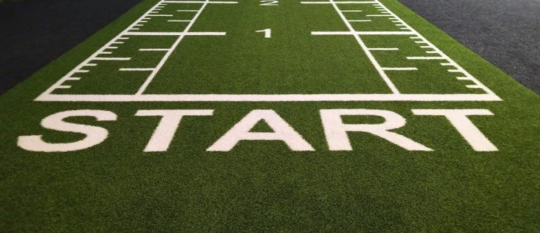 A sports field start line, representing the beginning of your family law process
